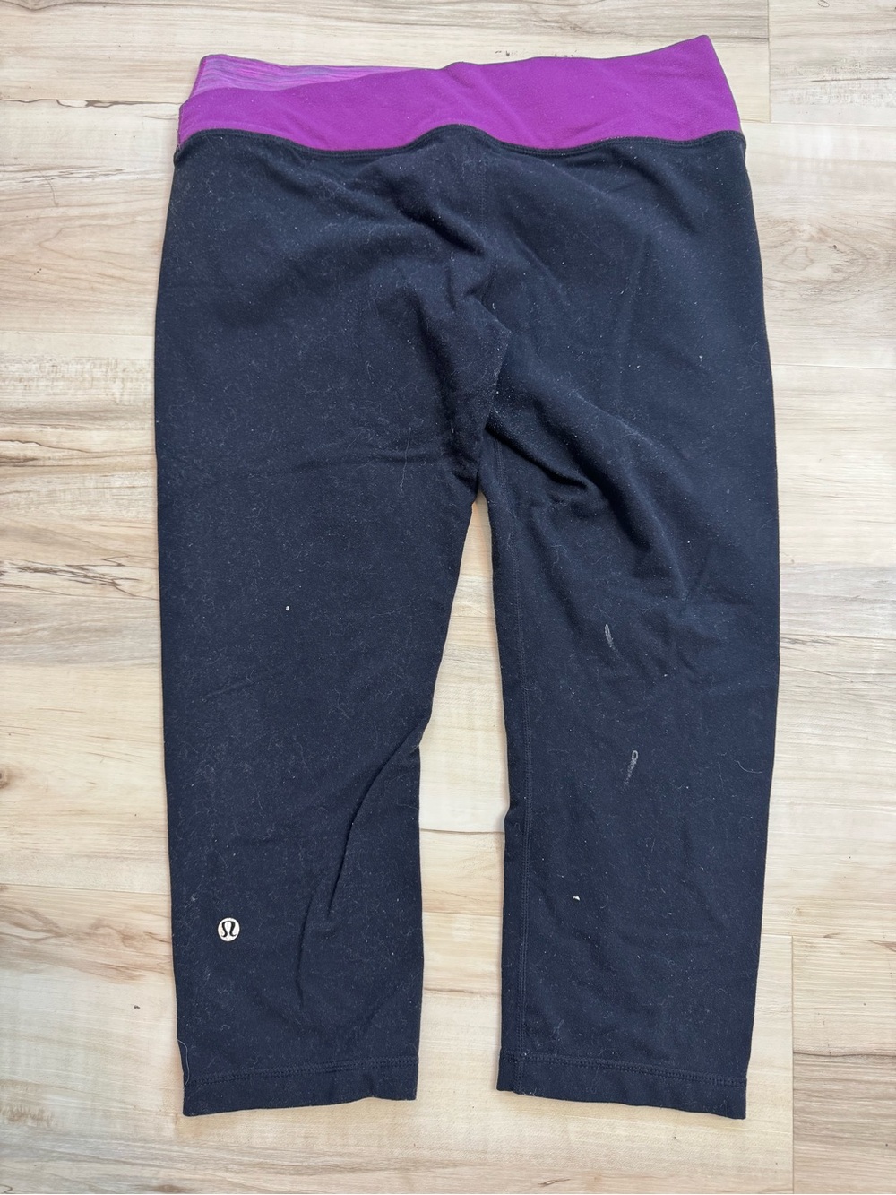 lululemon athletica Women’s' Black Capri Leggings with Purple Waistband